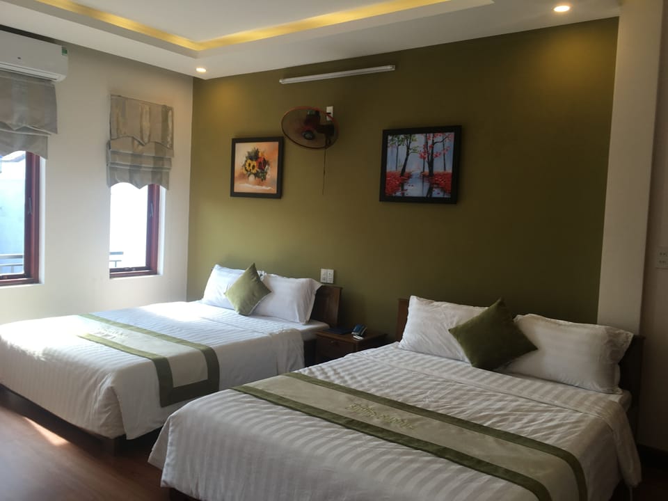 Family Room | Minibar, desk, blackout drapes, WiFi (free)
