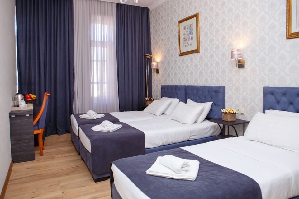 Standard Triple Room | Rollaway beds, free WiFi, bed sheets