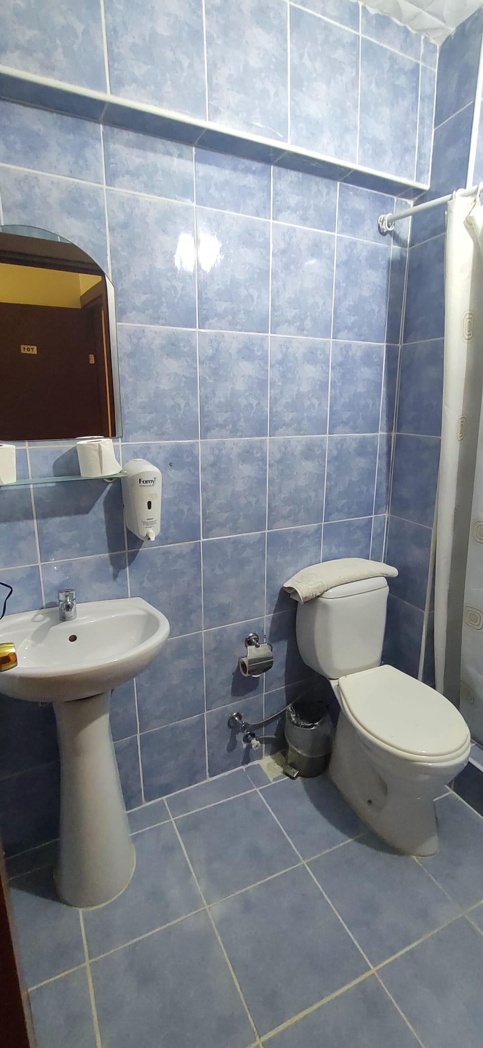 Shower, free toiletries, hair dryer, slippers