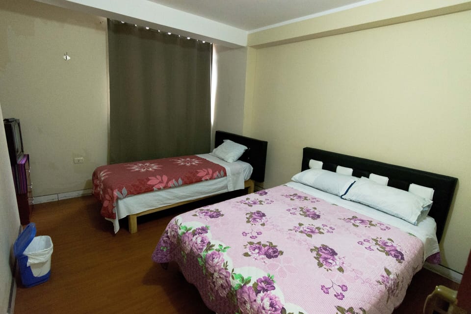 Family Triple Room, Shared Bathroom | Hypo-allergenic bedding, down comforters, desk, iron/ironing board