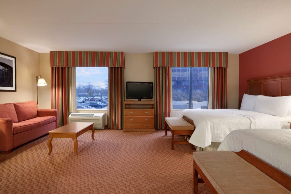 Two Queens Studio Suite Nonsmoking | Living area | 43-inch flat-screen TV with satellite channels, TV