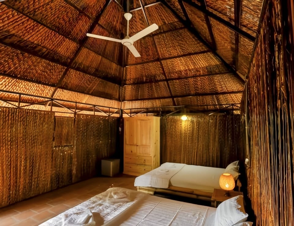 Deluxe Quadruple Room, Private Bathroom, River View | Bathroom | Shower, free toiletries, hair dryer, slippers