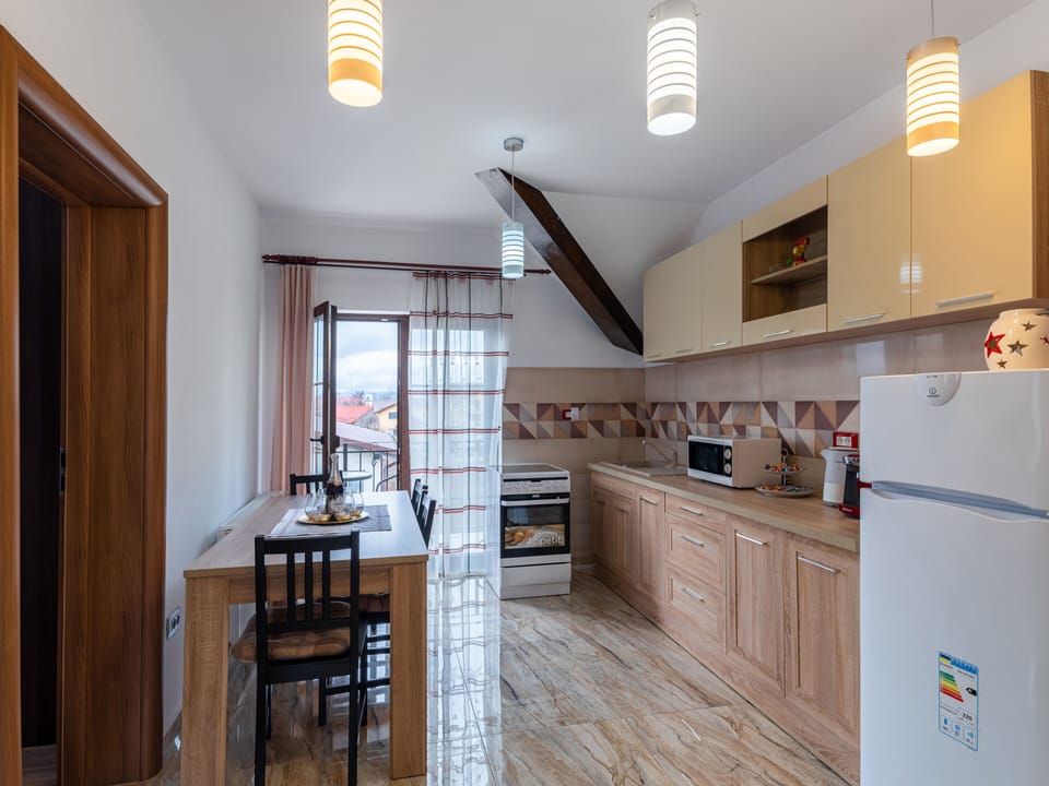 Apartment, 2 Bedrooms, Non Smoking, Balcony | Shared kitchen | Fridge, microwave, stovetop, espresso maker