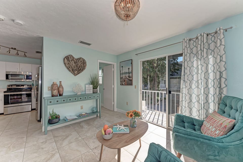 Island Serenity seating area view to kitchen & half bathroom
