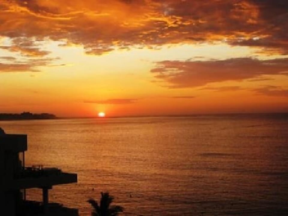 Beautiful sunrise from Medano beach. Steps from your condo!