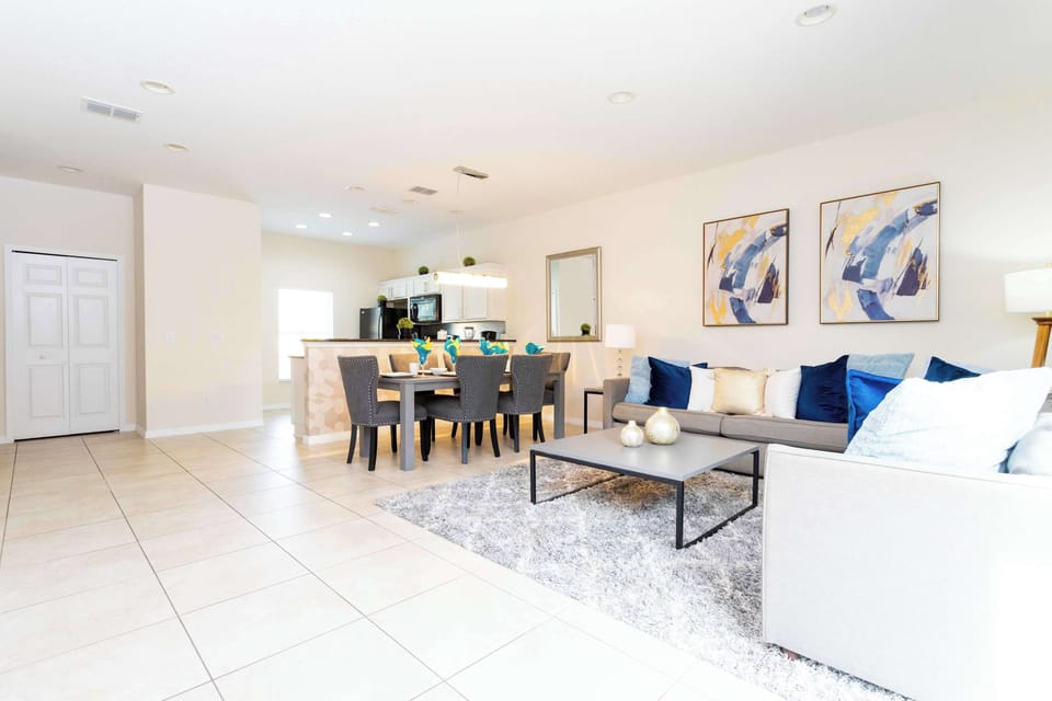 Open-Concept Living & Kitchen Space: Enjoy spacious comfort in this bright, stylish open-plan area perfect for socializing, relaxing, and creating memorable family meals.