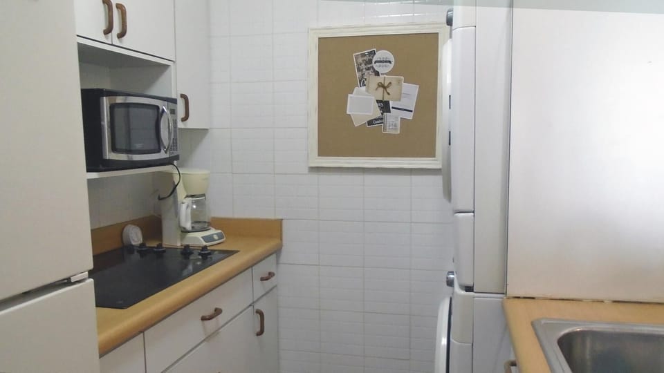 Fully equipped kitchen has all the essential tools and appliances

