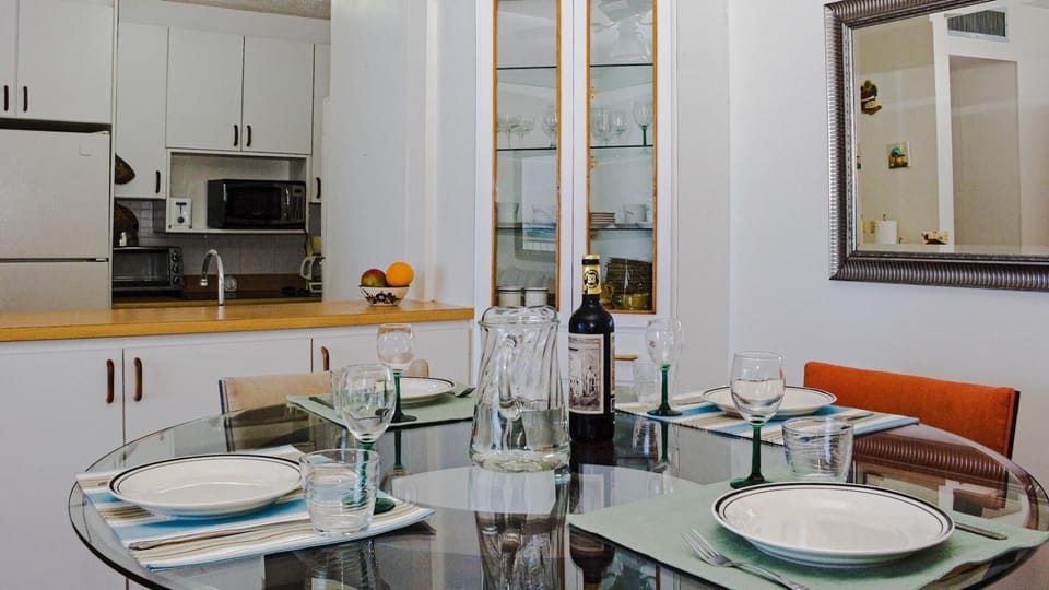 The dining room flows seamlessly into the kitchen, perfect for entertaining or f