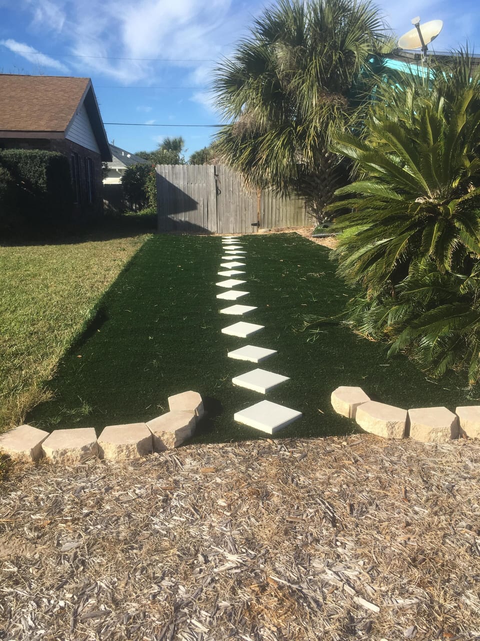 Additional parking area and walkway to back gate