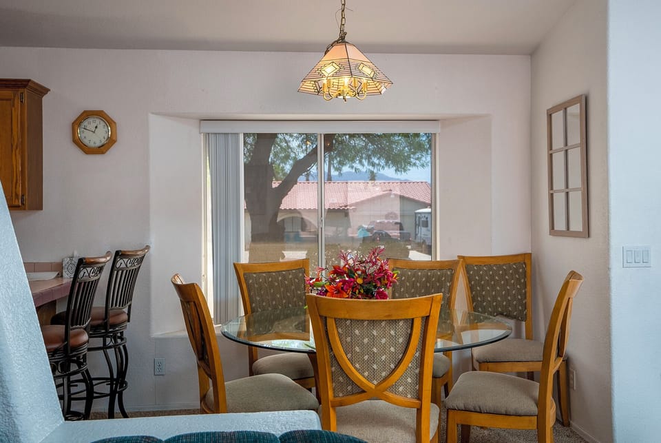 Breakfast bar to left formal dining room area to the right. 