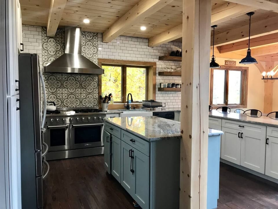 Cook's kitchen with 48" double oven and island.