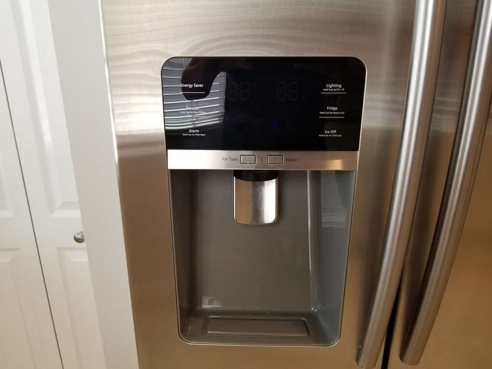 Stainless steel fridge with filtered water and built-in ice maker