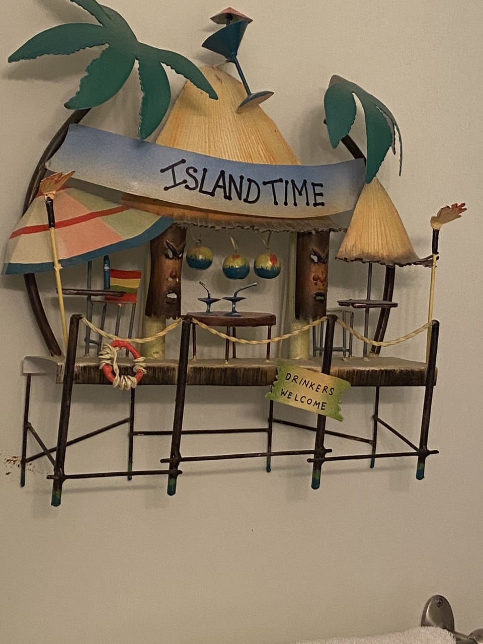 Funky beach picture on bathroom wall!