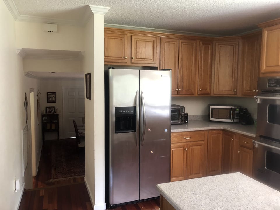 Kitchen with refrigerator/freezer, microwave, double oven, toaster