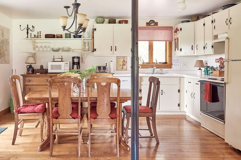The kitchen is organized & filled w/ all tools for meals w/ friends & family.