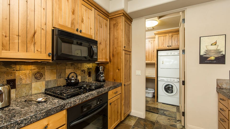 Large Kitchen Complete With All Dishes And Cookware And Spices