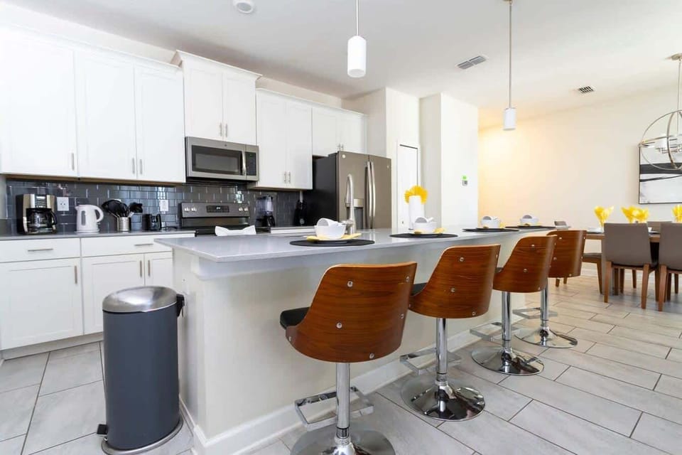 Enjoy a casual meal or drink at the kitchen isle 