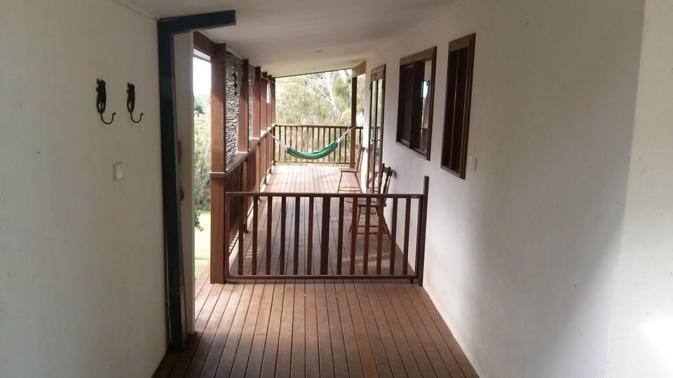 Walkway from parking area with gate for fully enclosed deck