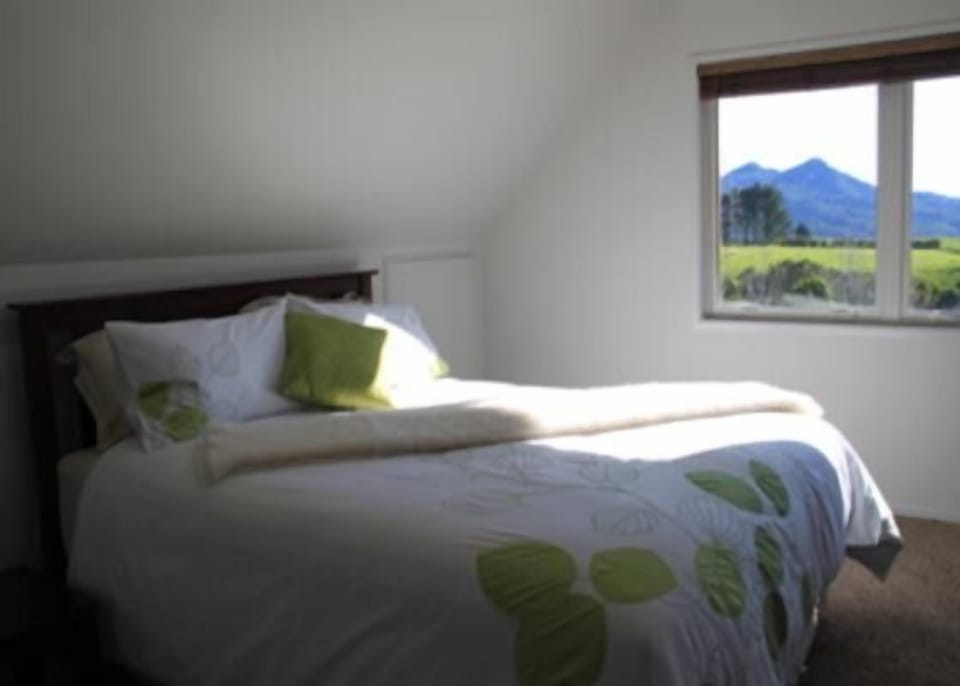 Upstairs bedroom with queen bed