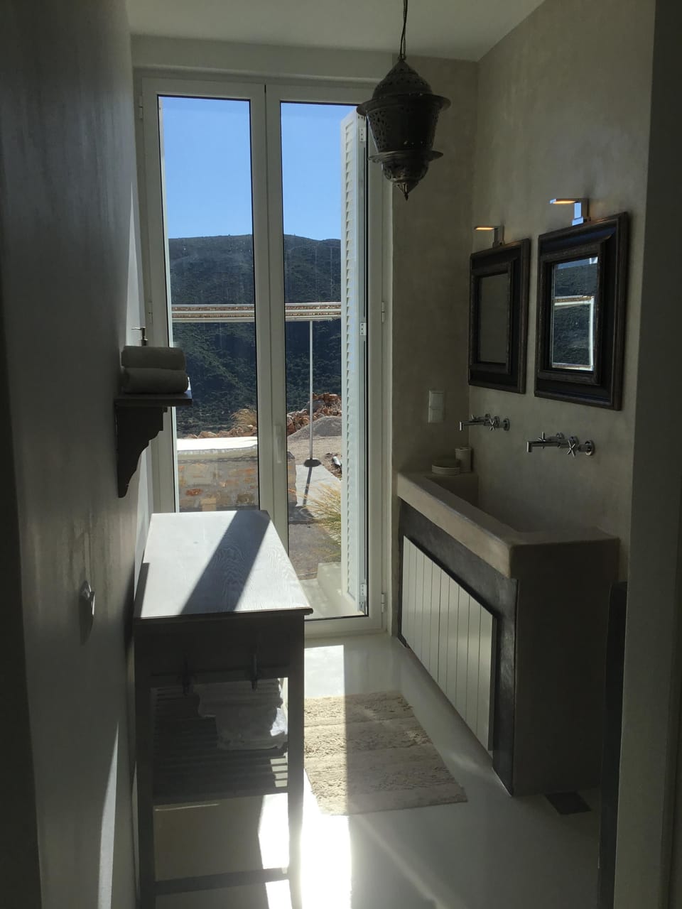 bathroom with big shower, double wastable and toilet. everything with beton-cire