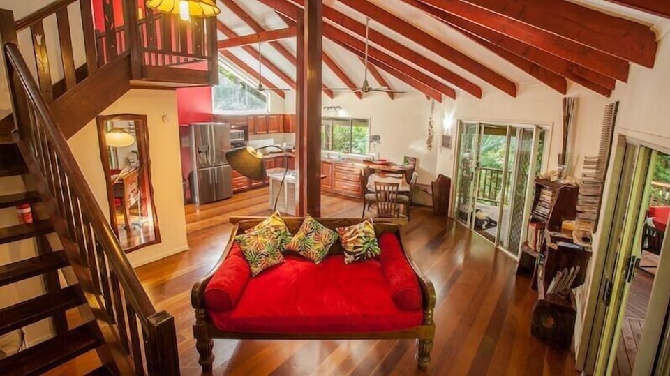 The large day bed and open plan living. Fans throughout keep you cool.