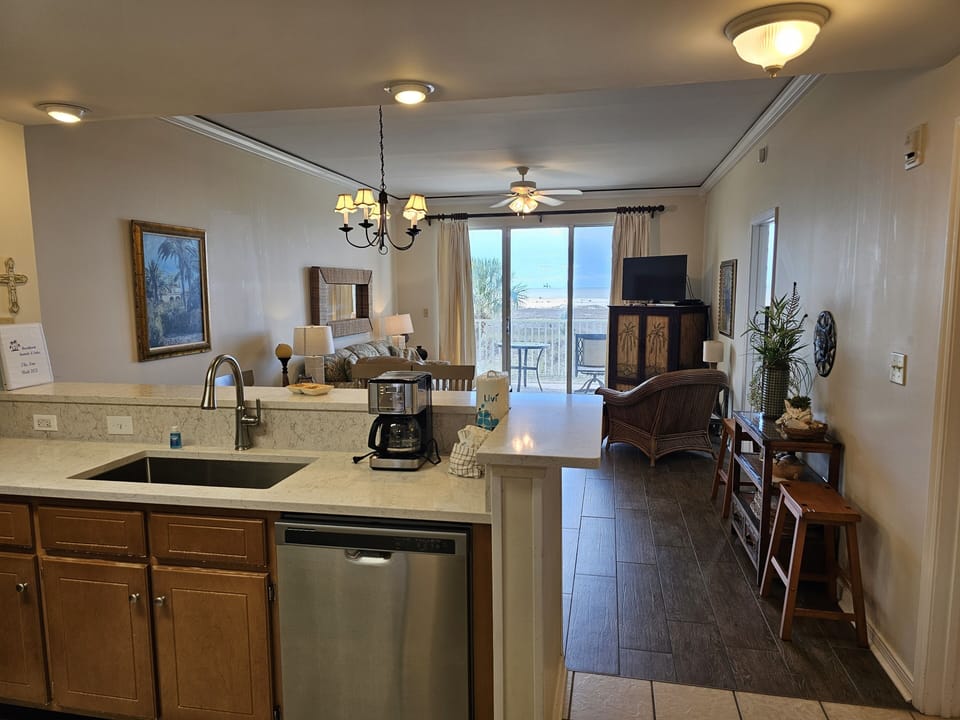 view of kitchen, dining area & living room
