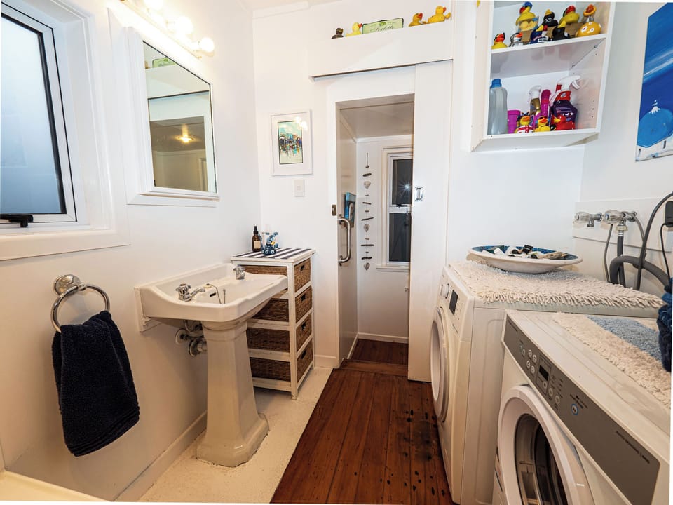 Bathroom, step down to toilet
Washing machine and dryer