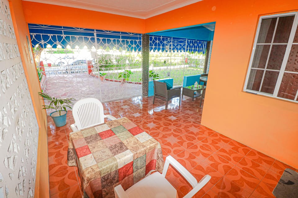 The veranda makes a great spot for al fresco dining in the warm Jamaican breeze.