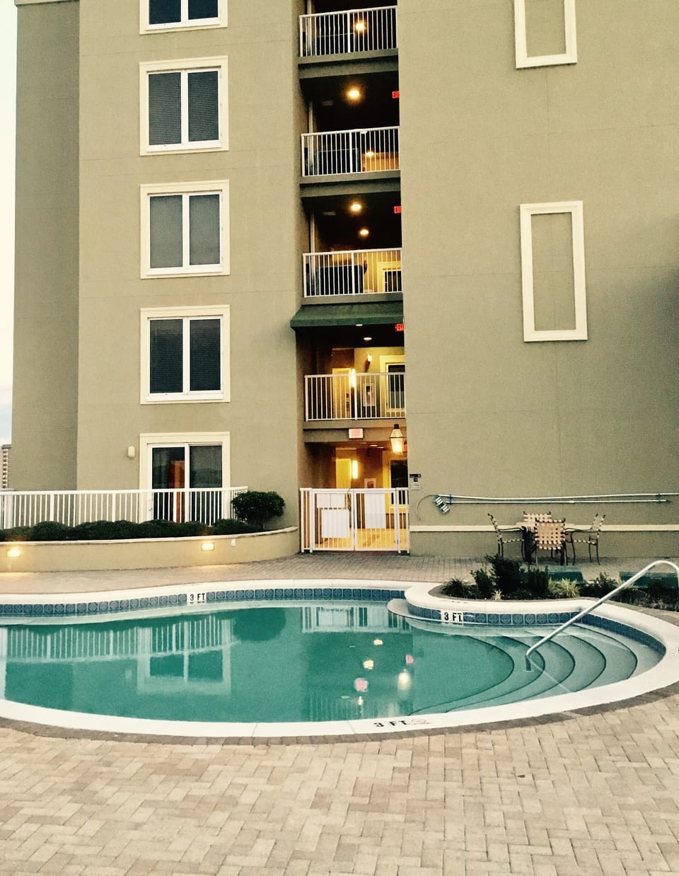 Your private gated patio overlooking the pool deck!