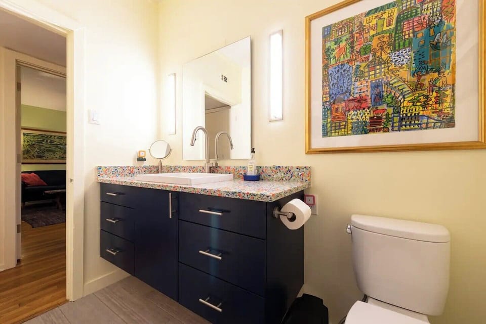 Front bathroom showing door leading into hallway 