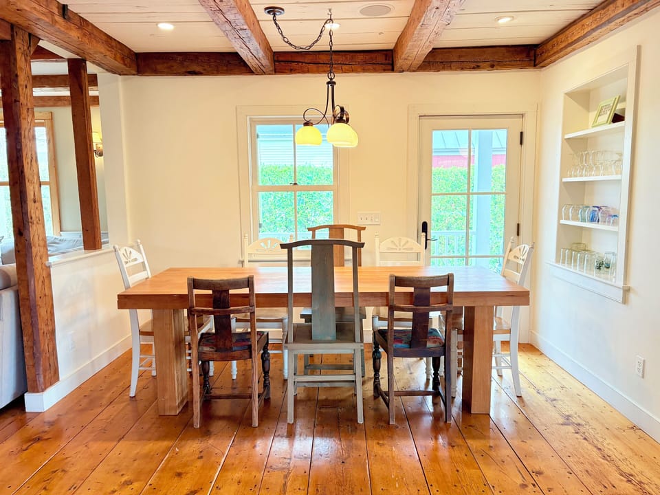 Dining area is open to the kitchen and seats 8 comfortably. 