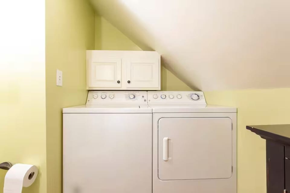 Upstairs bathroom washer and dryer