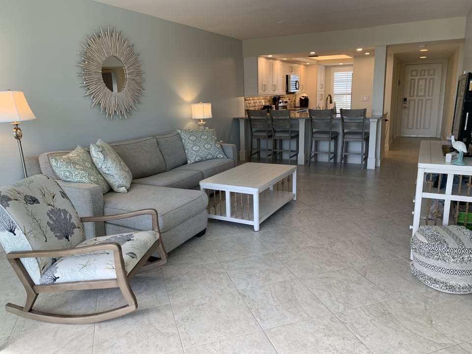 Open living with access to kitchen bar