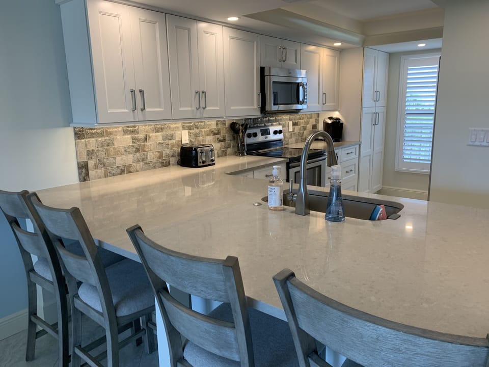 Updated kitchen with all utensils and appliances - including Keurig and coffee