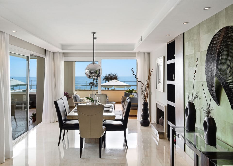 Dining area with fantastic views of the sea and pool and direct terrace access