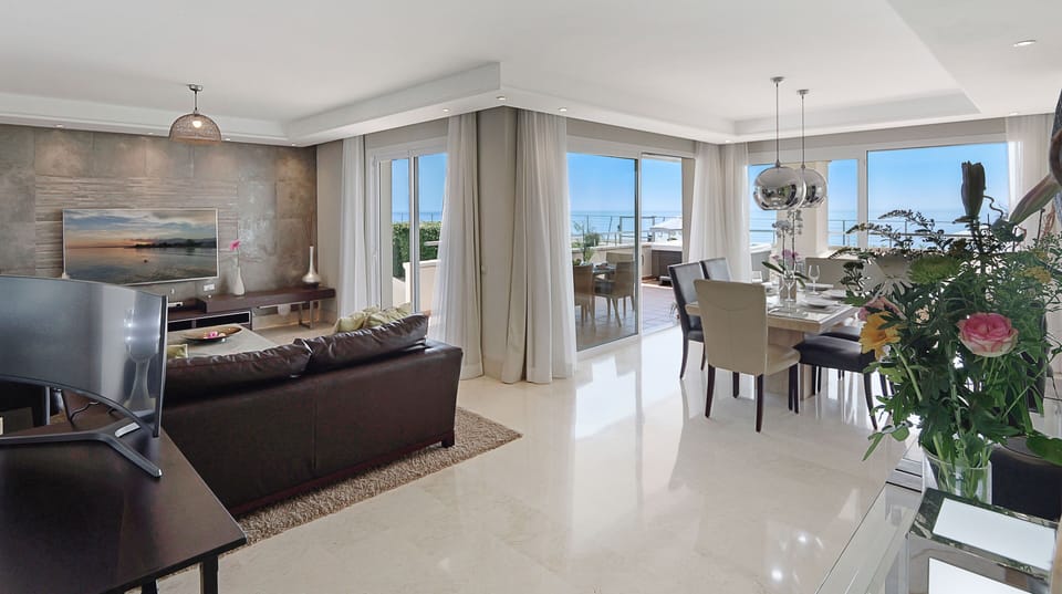 DIning room & living room,  great TVAudio & work station (on request). Sea views
