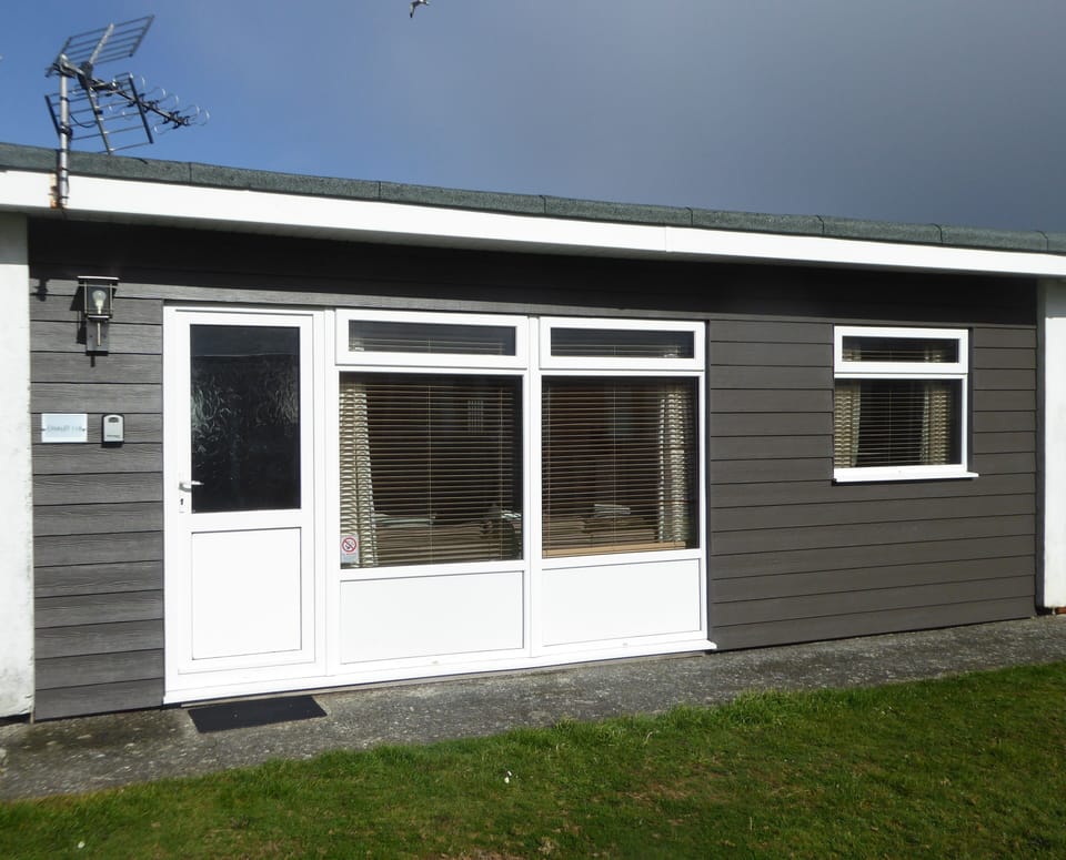 front of chalet showing thermal cladding. Warm in winter, cool in summer.
