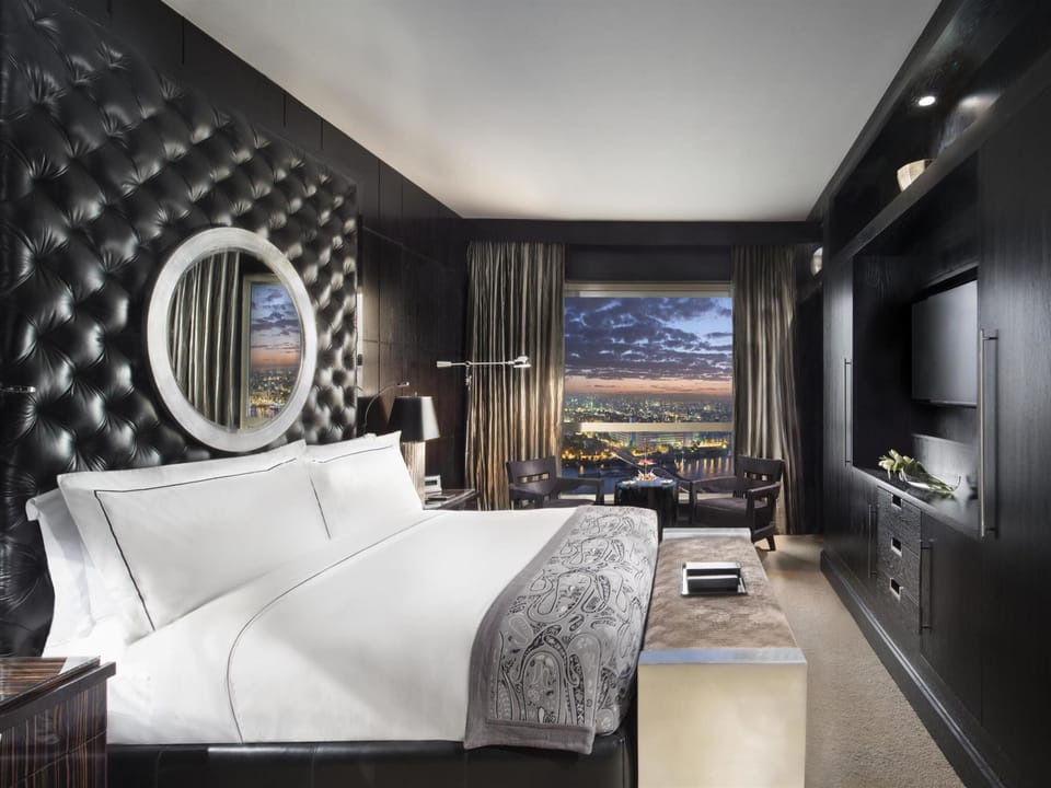 Premium bedding, down comforters, pillowtop beds, minibar