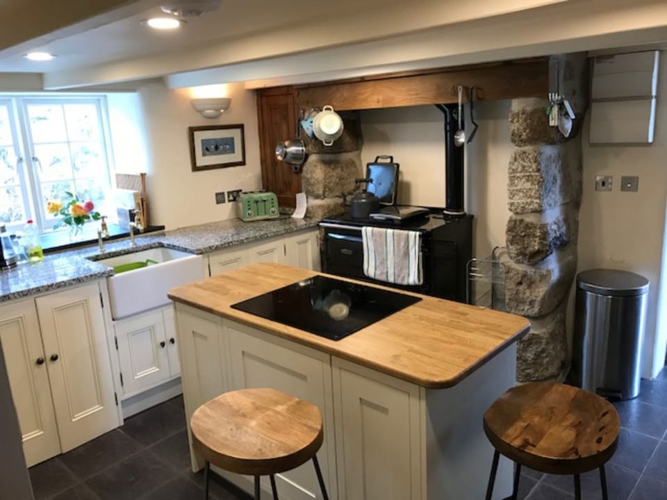 including a Rayburn range cooker and a new induction hob and electric oven.