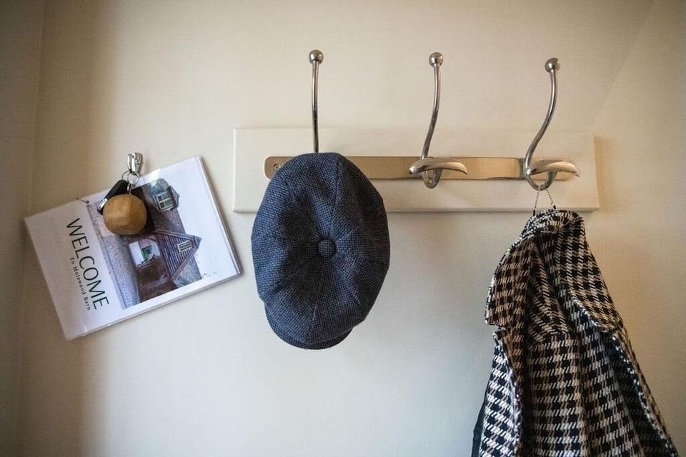 A place to hang your hat.  Hallway entrance 