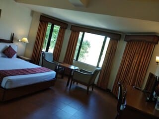 Deluxe Single Room, 1 Bedroom, Valley View | Minibar, in-room safe, desk, laptop workspace
