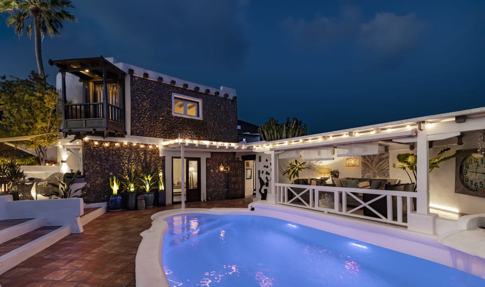 Main villa, alfresco “Palm” lounge, and floodlit pool, with dinning area terrace