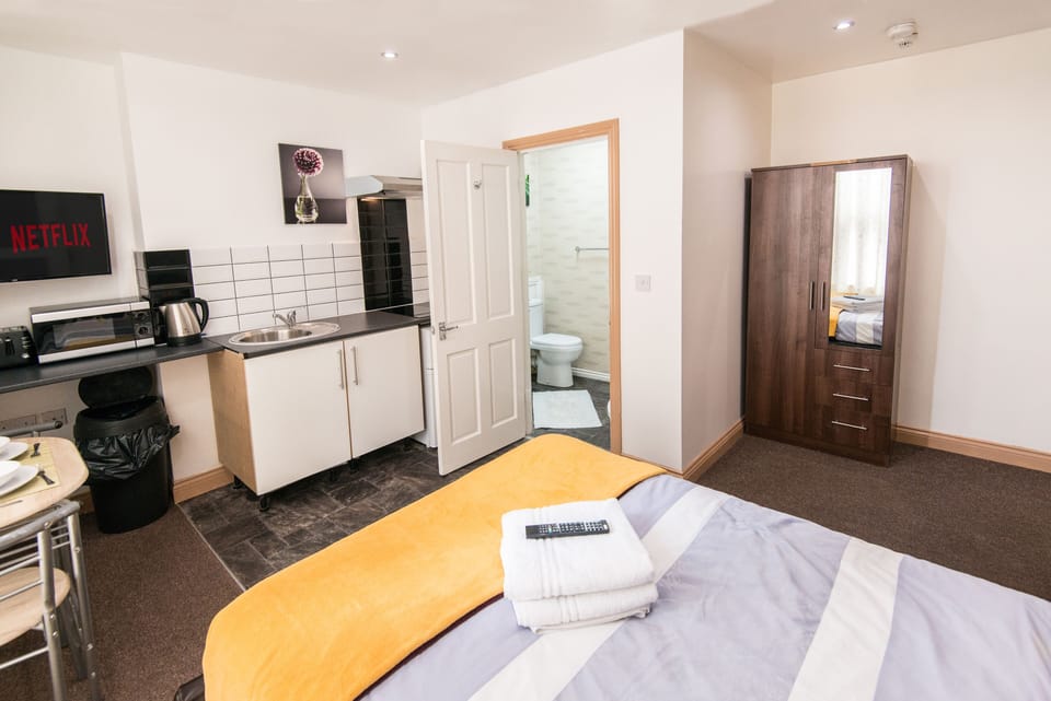 Studio, 1 Double Bed | Living area | Flat-screen TV