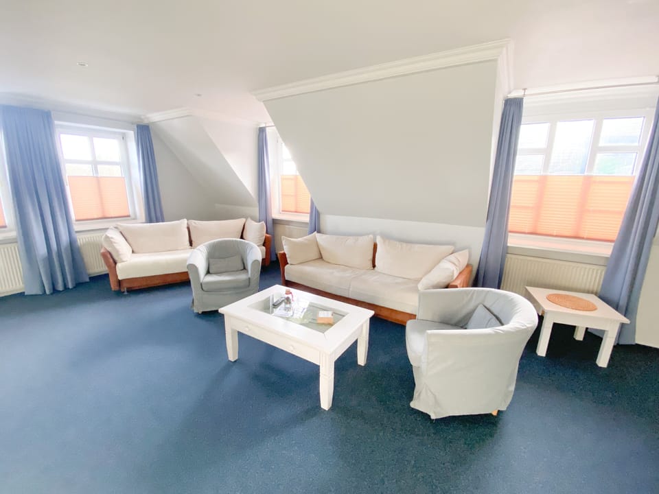 Basic Condo | Living area | Flat-screen TV