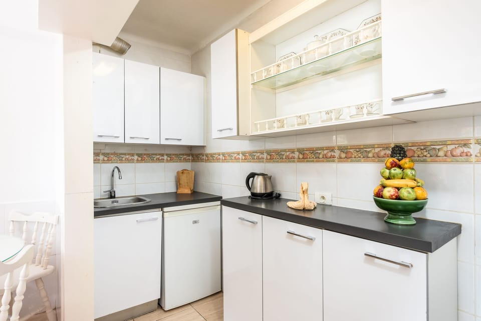Fully fitted, open plan kitchen.