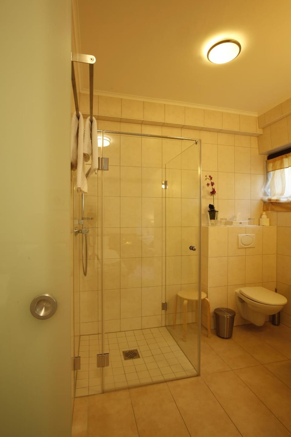 Shower, free toiletries, hair dryer, slippers