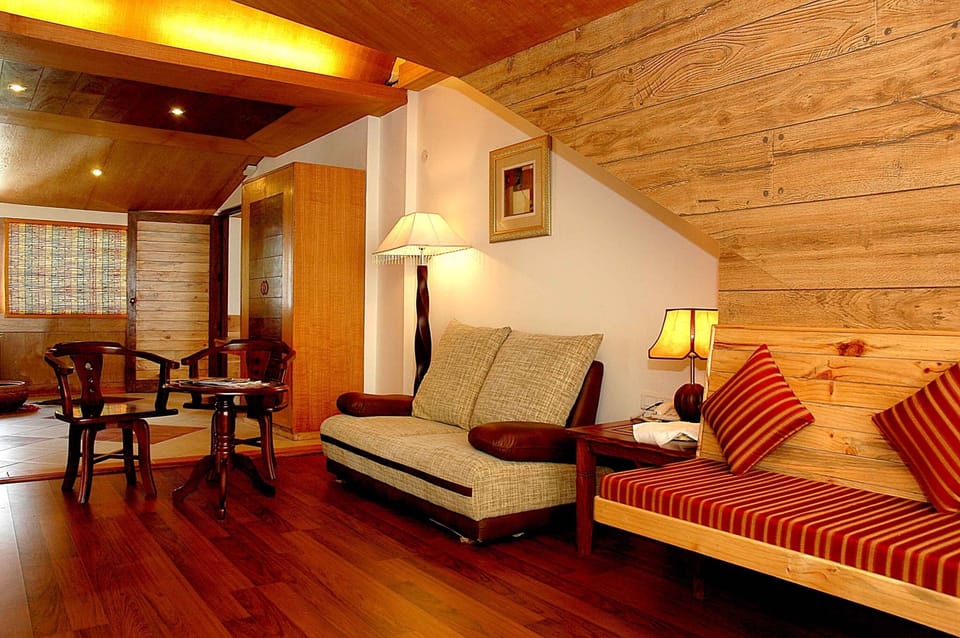 Family Suite, 1 King Bed with Sofa bed, Bathtub, Mountain View | Living room | LCD TV