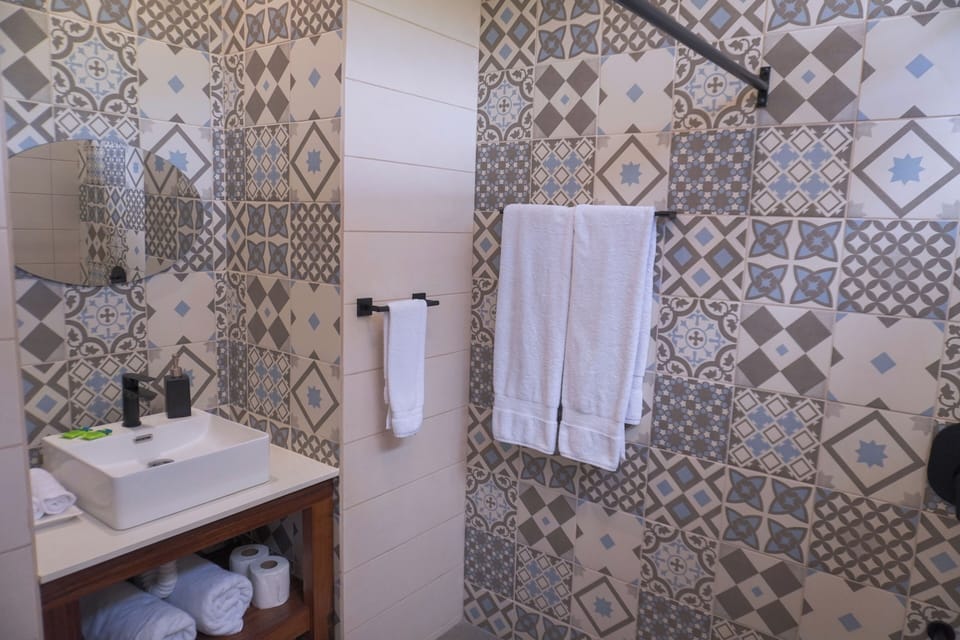Quadruple Premium Room | Bathroom | Shower, free toiletries, towels, soap