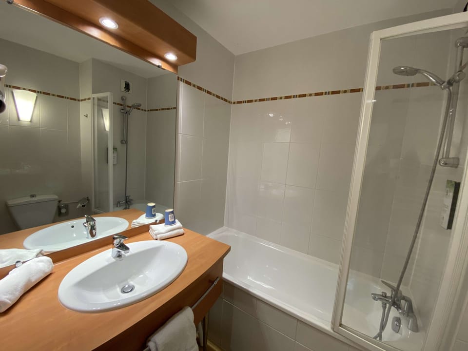 Eco-friendly toiletries, hair dryer, towels