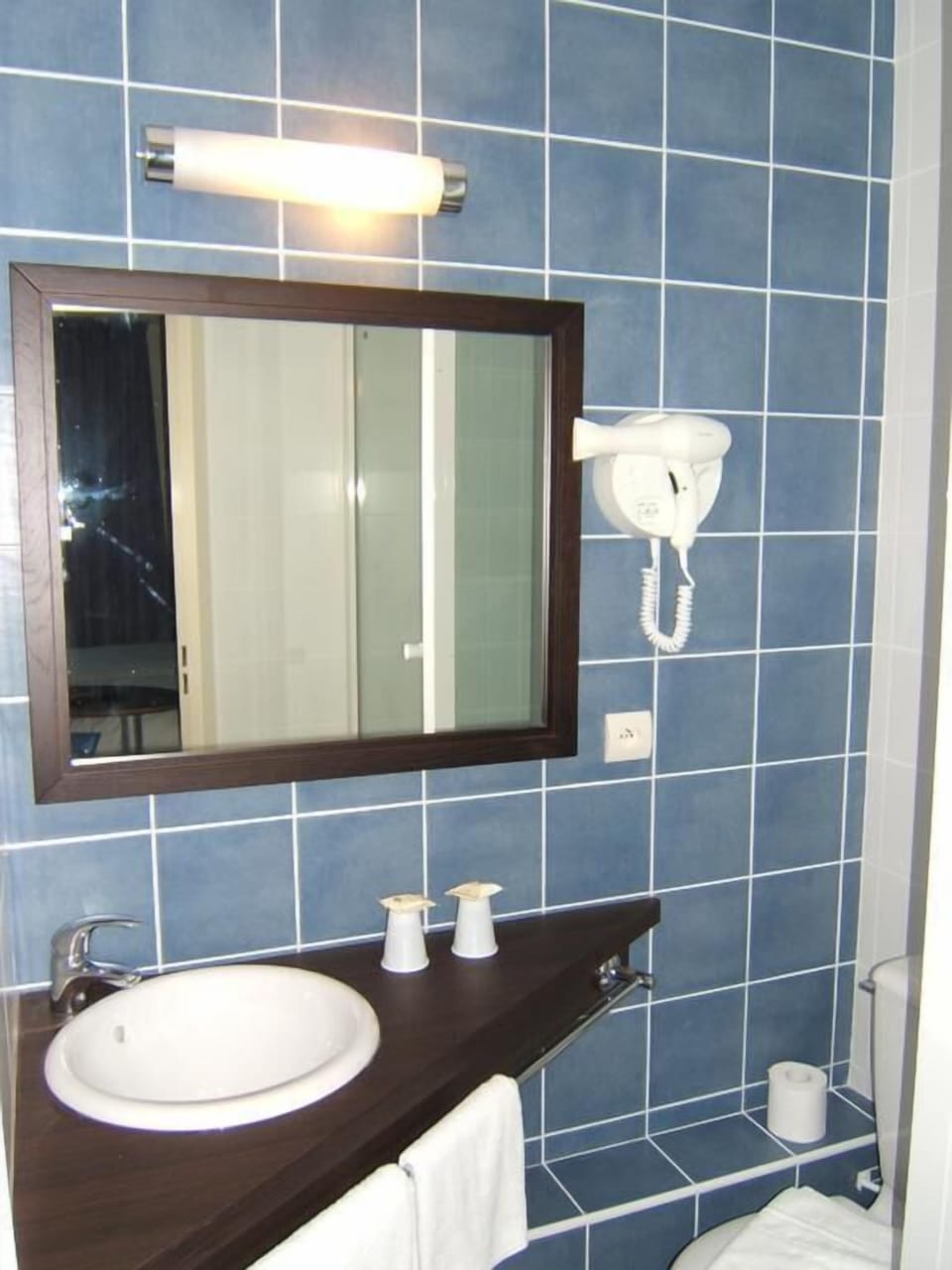 Shower, free toiletries, hair dryer, slippers